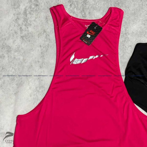 ست دو تیکه نیم تنه و کاور قهرمانی نایکی ست دو تیکه نیم تنه و کاور قهرمانی نایکی